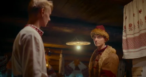 Historical reenactment of life of ancient Slavic people, merchant and peasant in Stock Footage 252118507