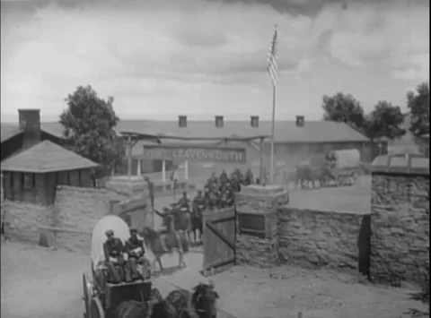 Historical reenactment of US cavalry leaving outpost 動画素材 260259256