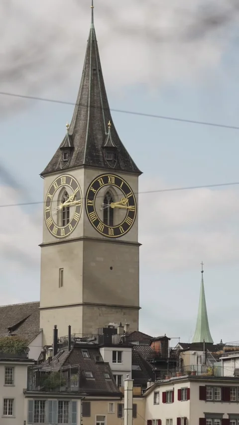 Historical st. Peter church clock tower, a prominent landmark in the old town of Stock Footage 332709505