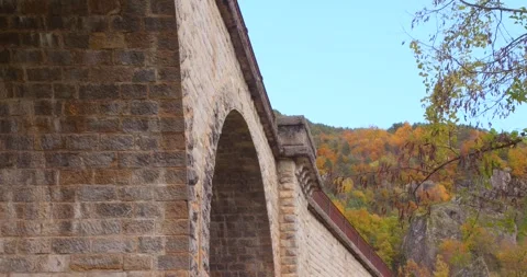Historical Stone Brick Viaduct During Autumn Season. Close-up Shot 库存影片 333469059