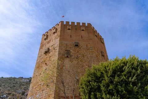 Historical stone house and historical alanya red tower Stock Photos