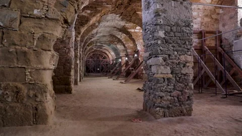 Historical Stone Vaulted Corridor with Structural Reinforcements Stock Footage 336850455