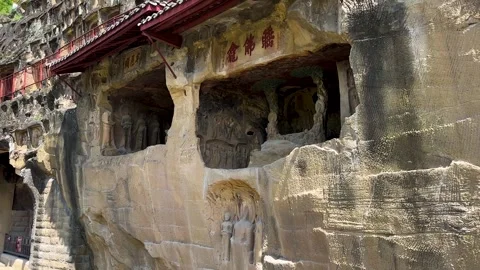 Historical Thousand-Buddha Cliff on eastern bank of Jialing River in Guangyuan Video stock 316441152