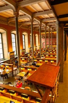 The historically significant library, with its open space and arched ceilings Stock-Fotos