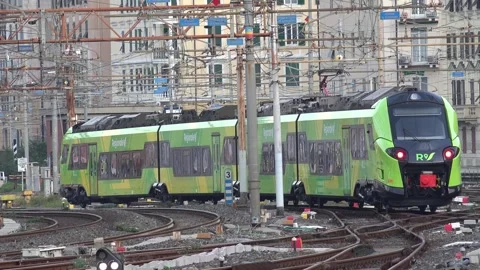 Hitachi ETR 104-075 electric train in the new Trenitalia Regional livery lea Stock Footage 291820002