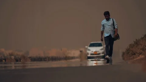 Hitchhiker looking for a ride Stock Footage 108587241
