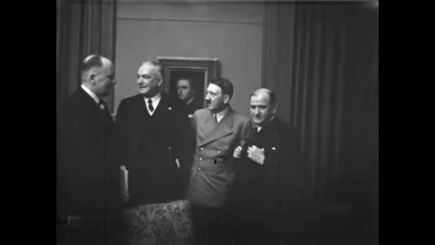 Hitler observes Mussolini signing the Munich Agreement, 30 Sep 1938 Stock Footage 252128368