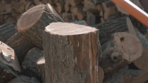 Hits the log with an ax Stock Footage 127595861