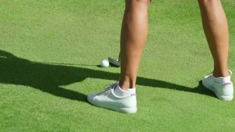 Hitting the ball in golf, setting and footwork of the player. Stock Footage 217378389
