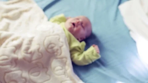 Hitting the camera on the sleeping child Stock-Footage 80081278