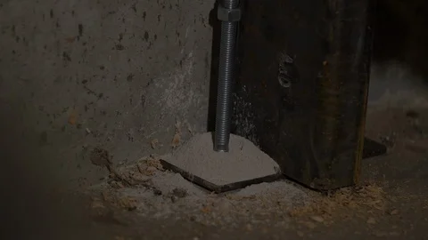 Hitting Concrete Anchor in Left Side Column Stock Footage 100693687