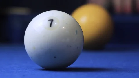 Hitting the cue ball number 7 on a blue billiard ball. Stock Footage 89152776