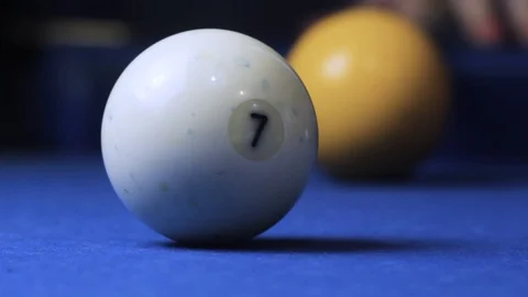 Hitting the cue ball number 7 on a blue billiard ball. Stock Footage 89152791