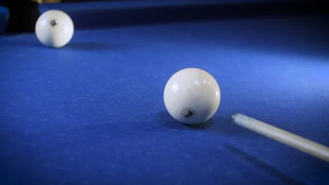 Hitting the cue ball number 7 on a blue billiard ball. The billiard ball hits Stock Footage 89152816