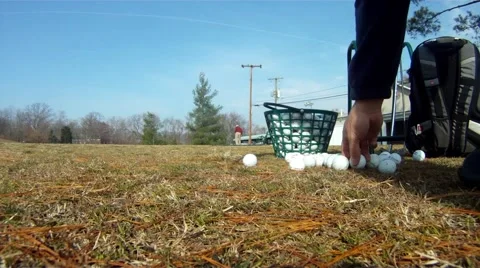 Hitting a golf ball at the practice range 3.mp4 Video stock 42998144