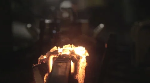 Hitting off molten steel using hammer Stock Footage 44288504