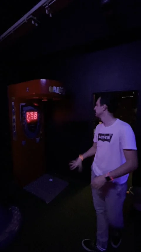 Hitting the punch machine Stock Footage 192899989