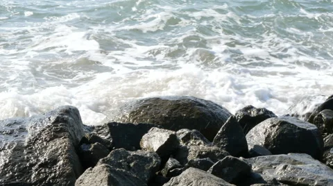 Hitting Waves In Stones 4K Video stock 66262419