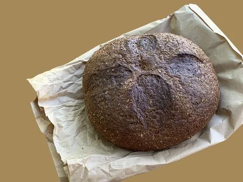 хлеб1Round rye bread with additives.  Stock Photos