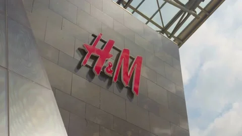 H&amp;M logo on the modern buliding, mall. Stock Footage 132728053