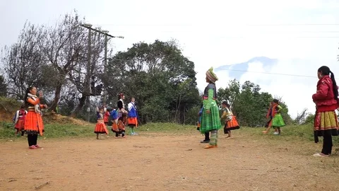 Hmong children playing "Con" throwing game Stock Footage 88978468