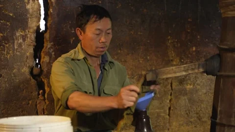 Hmong corn wine in Ban Pho Bac Ha Stock Footage 262065160