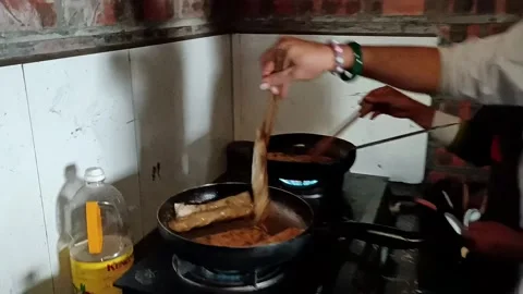 HMong sisters deep-frying the vegetable spring rolls Stock Footage 248238186