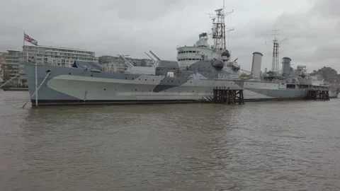 HMS Belfast moored on the River Thames Stock Footage 143863819