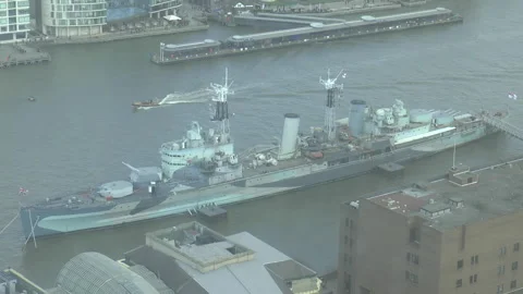 HMS Belfast River Thames And passing Rib Boat Stock Footage 172061304