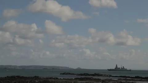 HMS Daring overlooking islands in the Channel Islands Stock Footage 12213102