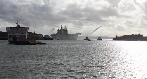 HMS Illustrious returns from the philippines Stock Photos