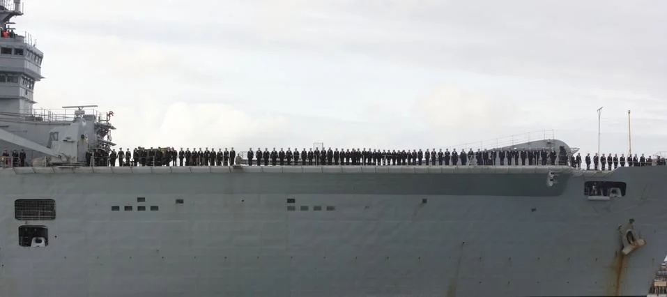 HMS Illustrious returns from the philippines Stock Photos
