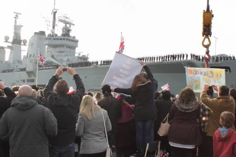HMS Illustrious returns from the philippines Stock Photos