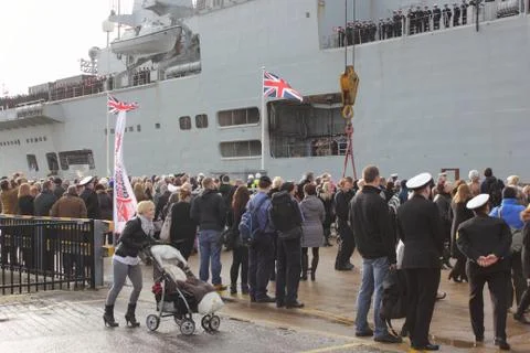 HMS Illustrious returns from the philippines Stock Photos