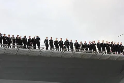 HMS Illustrious returns from the philippines Stock Photos