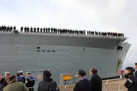 HMS Illustrious returns from the philippines Stock Photos