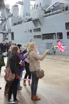 HMS Illustrious returns from the philippines Stock Photos