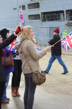HMS Illustrious returns from the philippines Stock Photos