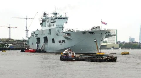 HMS Ocean, moored in the River Thames at Greenwich, South London. Stock Photos