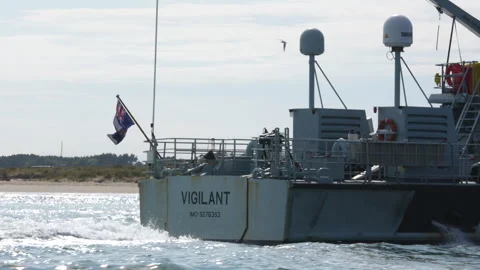 HMS Vigilant Border Force Multiple Angles Moving through bumpy water Stock Footage 246420343