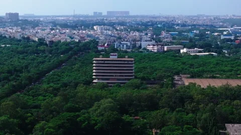 HMT Machine Tools Ltd with greenery and background residential buildings at Stock Footage 346641805