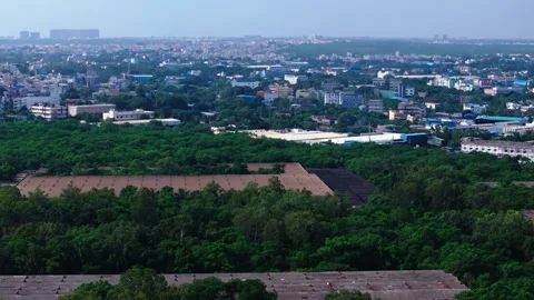 HMT Machine Tools Ltd with Jeedimetla industrial area and urban greenery at Stock Footage 346958948