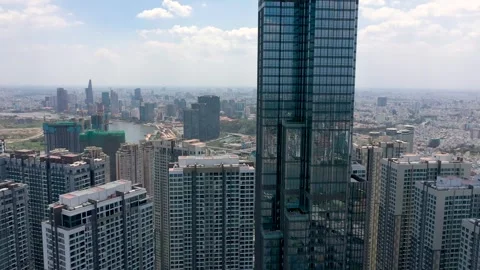 Ho Chi Minh City, Vietnam - May, 2023: Aerial view of center of Saigon riverside Stock Footage 241256653