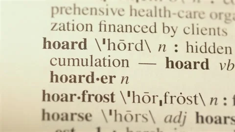 Hoard word on dictionary page reading letters Vídeos de archivo 267176267