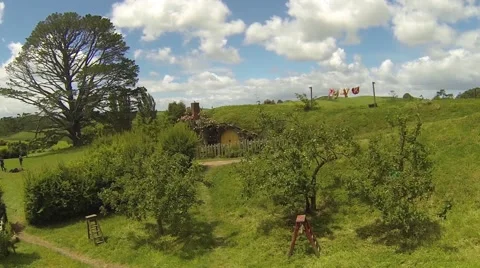 Hobbit hole with party tree in the background Stock Footage 48213155