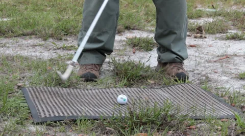 Hobby golfer practices swing Stock Footage 37250185