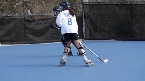 Hobby Kids inline skating skaters Roller Hockey game stadium sport court Stock Footage 86124662
