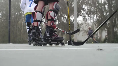 Hobby Kids inline skating skaters Roller Hockey game stadium sport court Stock Footage 86131519