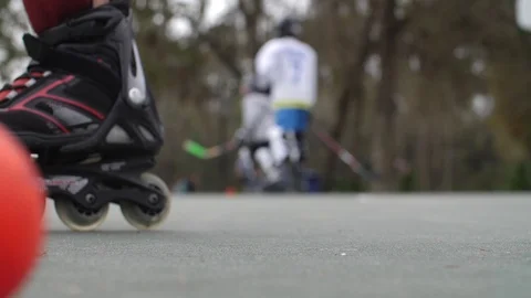 Hobby Kids inline skating skaters Roller Hockey game stadium sport court Stock Footage 86132372