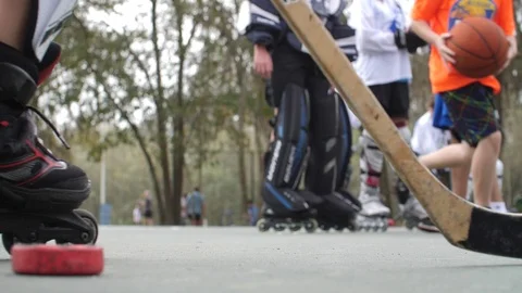 Hobby Kids inline skating skaters Roller Hockey game stadium sport court Stock Footage 86133545
